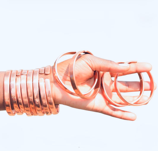 Adjustable solids copper bangles